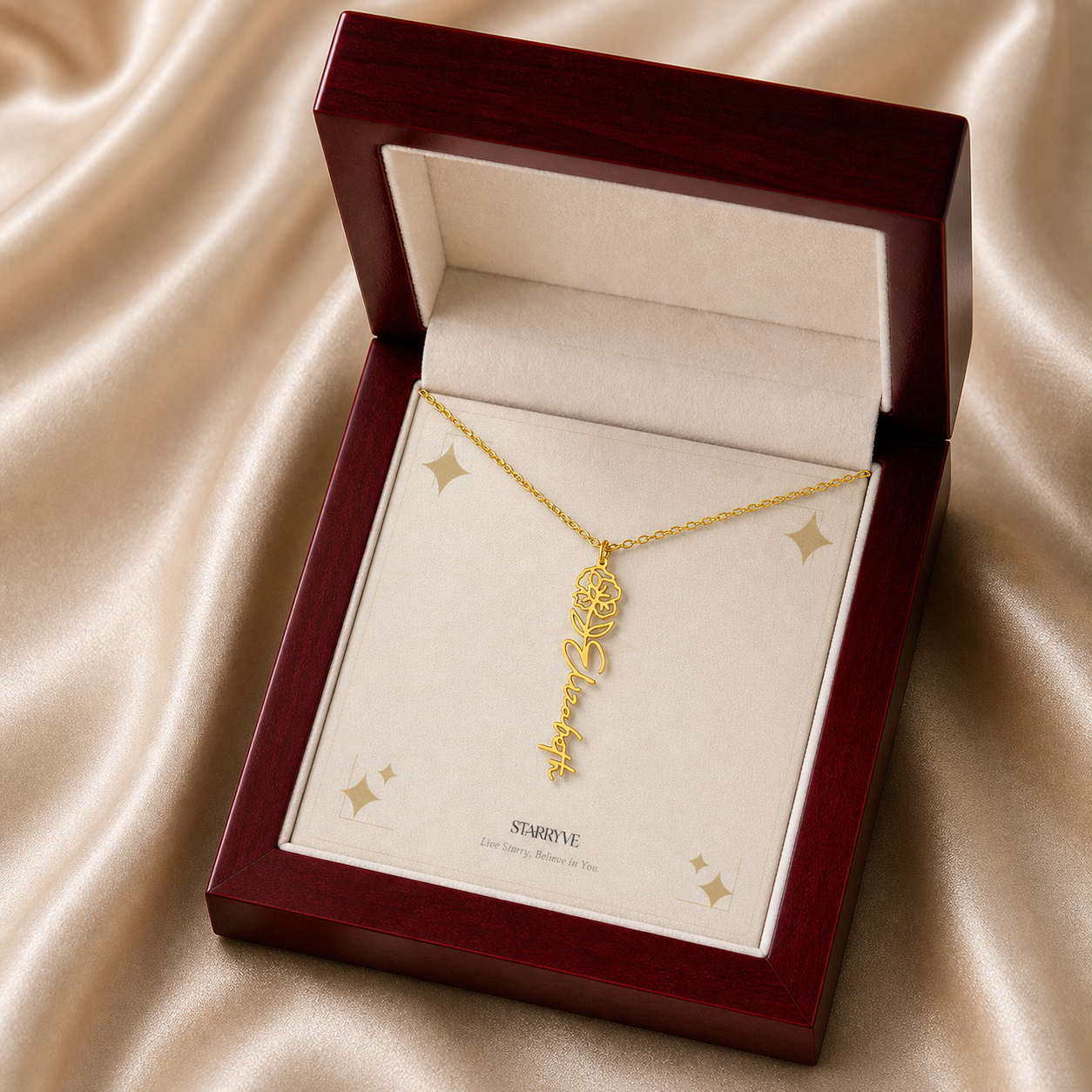 Gold flower name necklace displayed in a mahogany LED luxury gift box