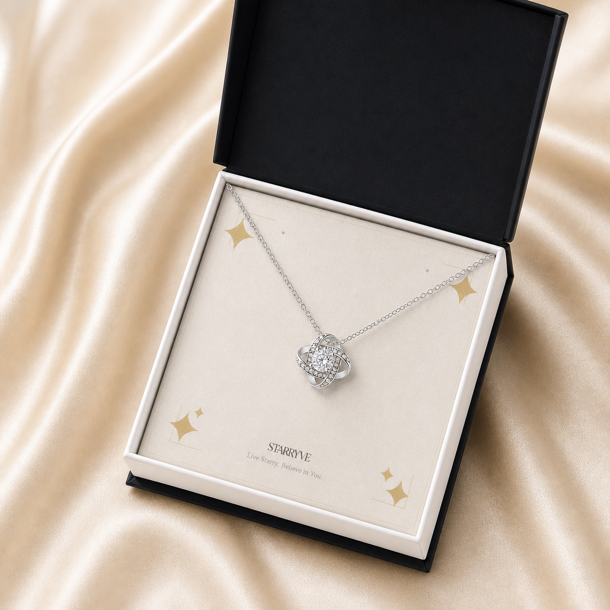 White gold finish love knot necklace in a black standard gift box