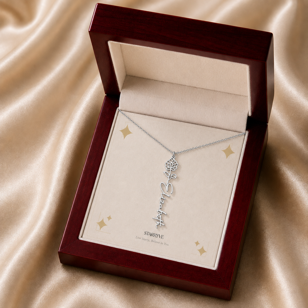 Silver flower name necklace displayed in a mahogany LED luxury gift box