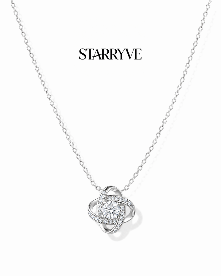 14K white gold love knot necklace with a pavé cubic zirconia pendant on a fine chain